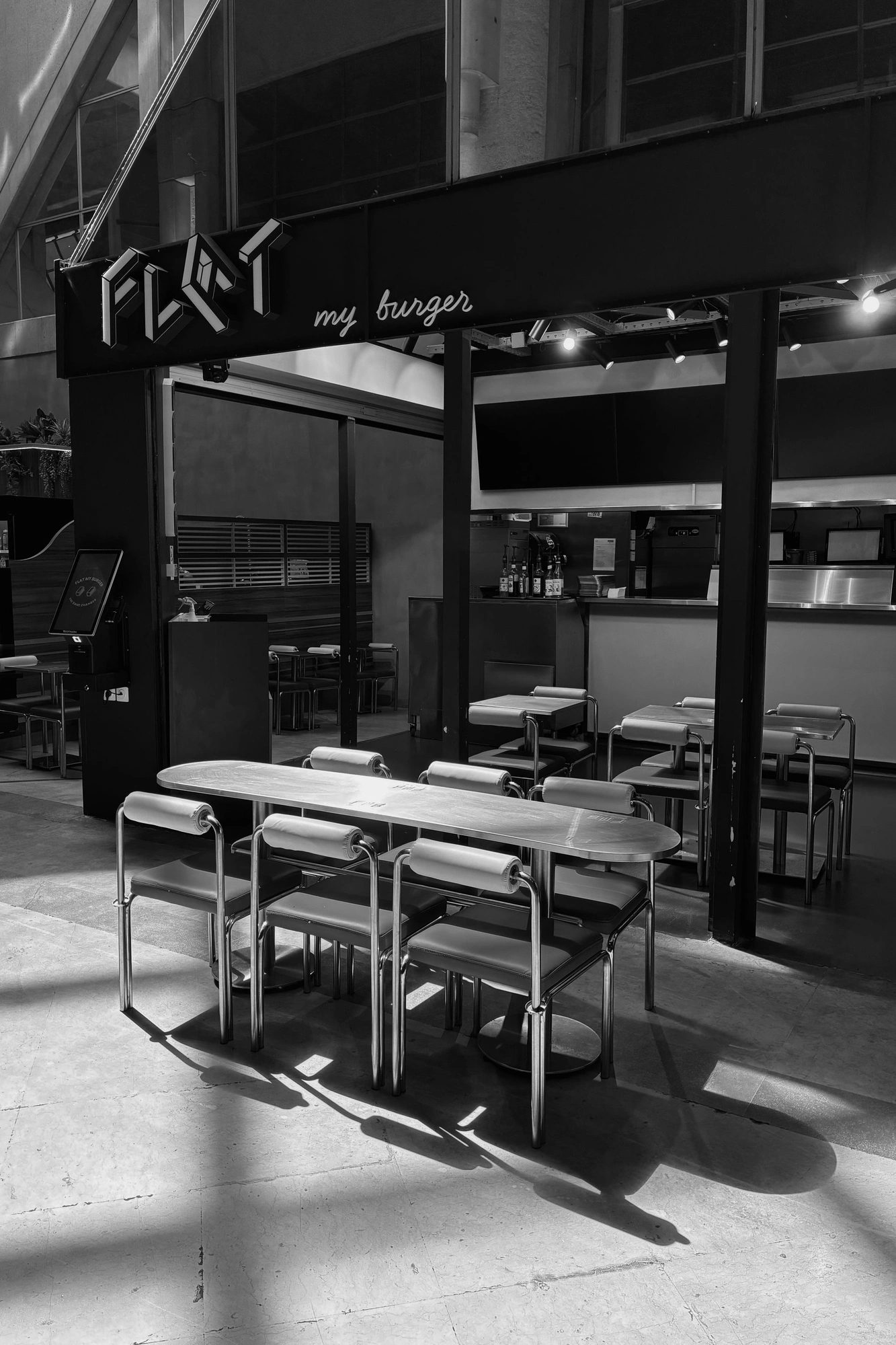 2026-07-06 - xt35 - bw - FR - Paris - Summer in Paris - Chairs in mall
