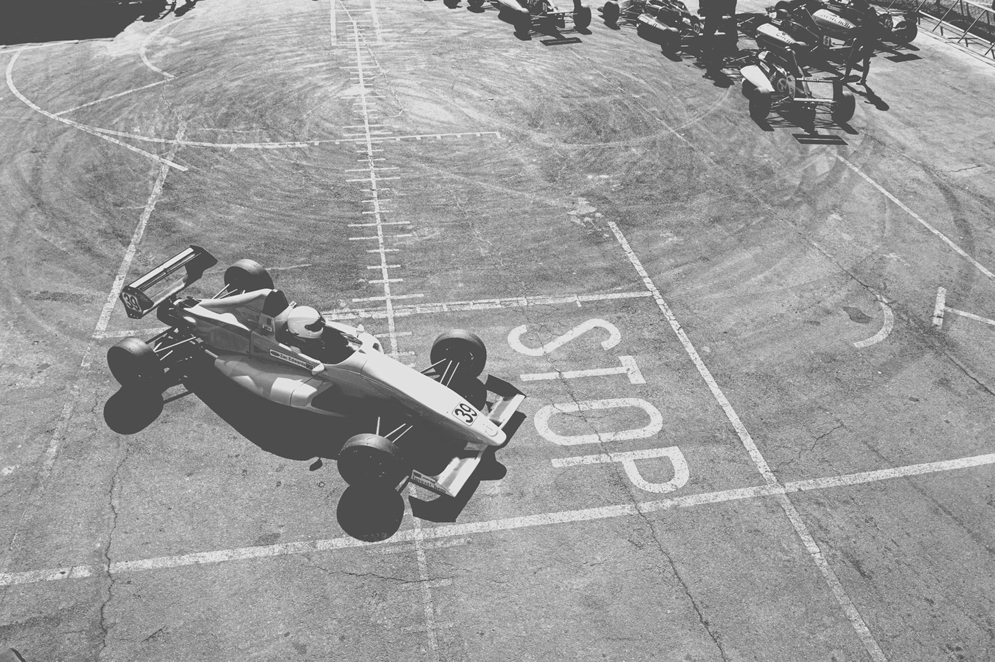 2019-07-27 - n18-55 - bw - ZA - Zwartkops Raceway - Racecar parked over stop sign